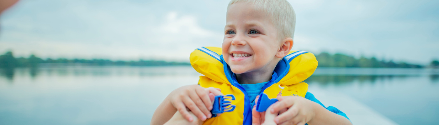 Toddler in a yellow lift jacket